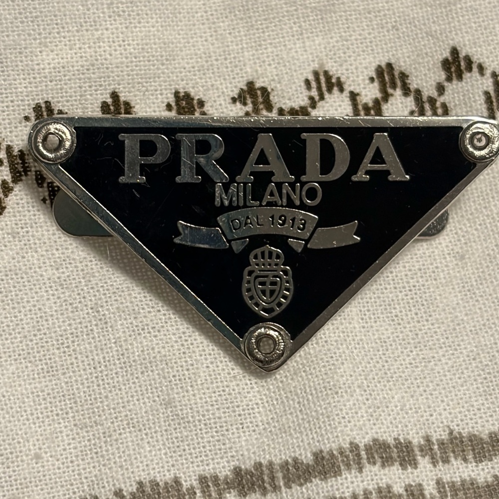 Prada Triangular Black and Silver Logo Pin